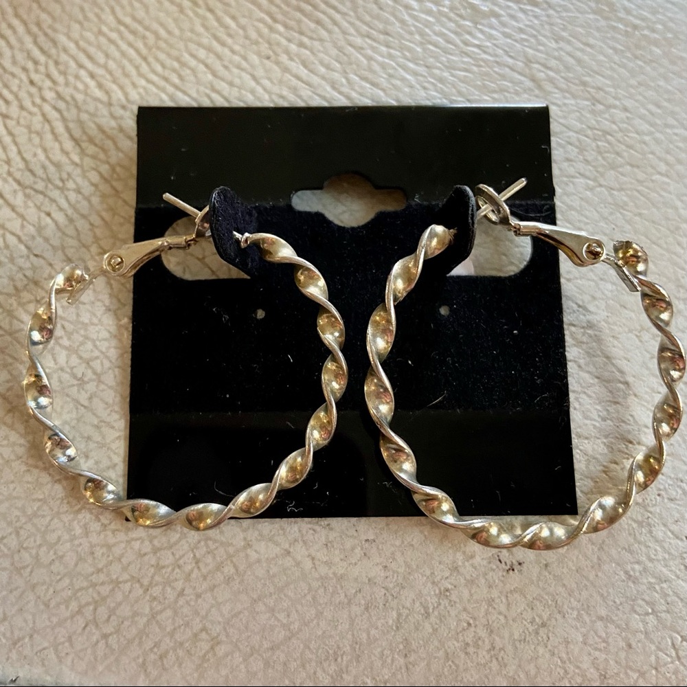 Silver hoops twisted style good condition
